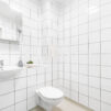 Interior of a white tiled shower room