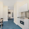 open plan living space with kitchen facilities