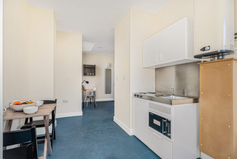 open plan living space with kitchen facilities