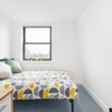 Interior view looking towards the window showing a double bed