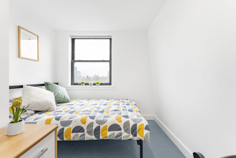 Interior view looking towards the window showing a double bed